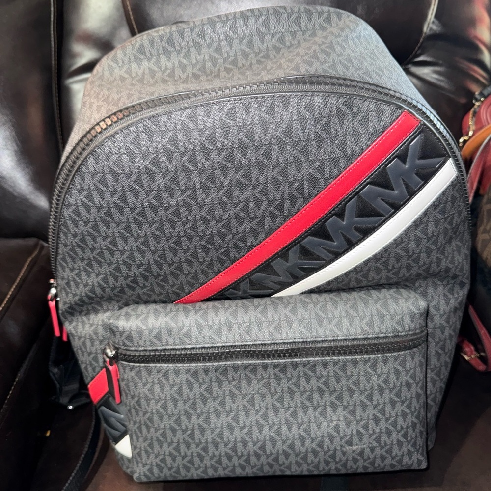 Michael Kors Gray and Red Backpack with Monogram Pattern